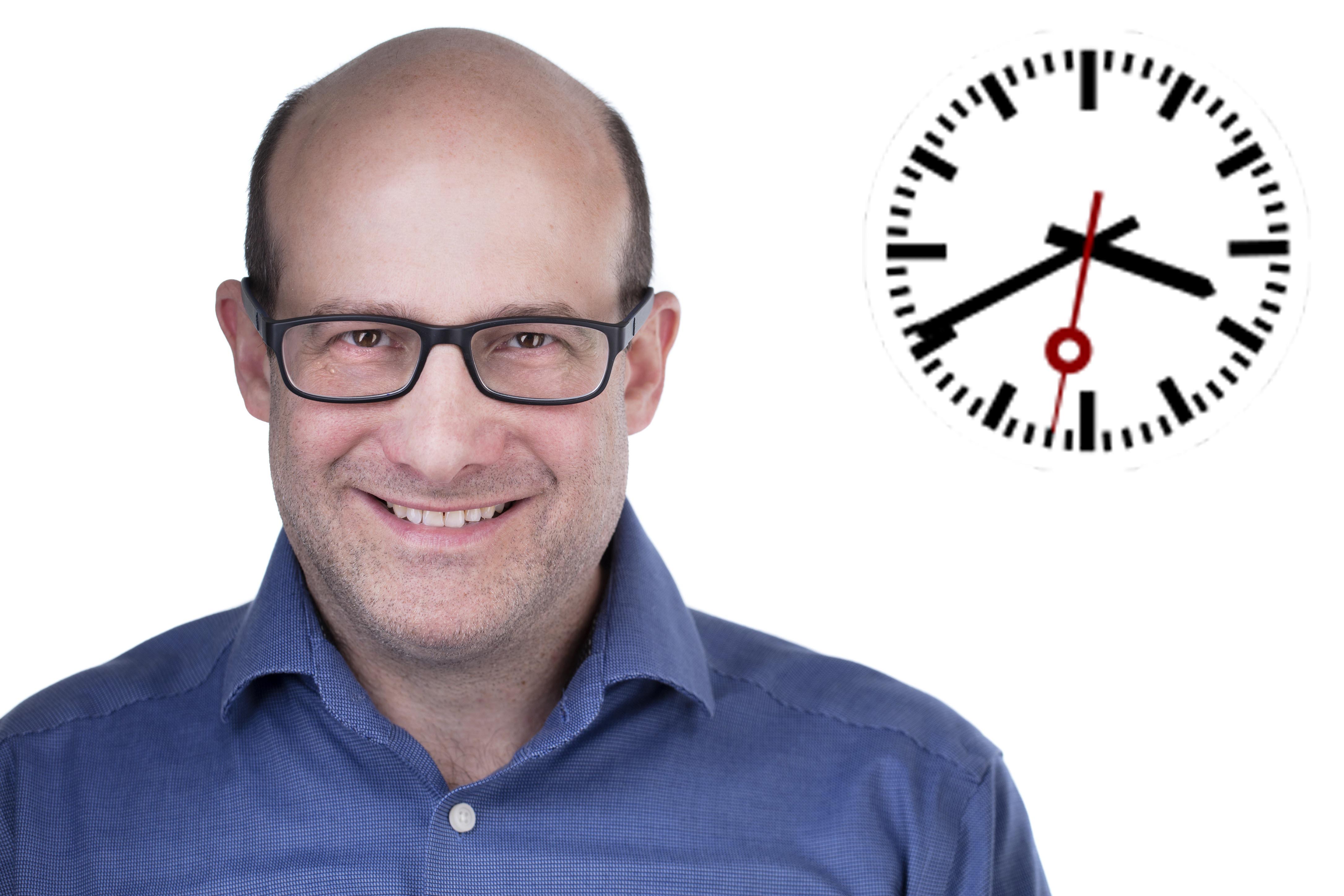 Dave Pennock with the Test of Time clock icon